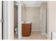 Neutral bathroom featuring a wood vanity, large mirror, and a shower with glass door at 9226 Southern Oak Ln, Ladson, SC 29456