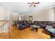 Inviting living room boasts hardwood floors, cozy seating, and ample natural light at 9226 Southern Oak Ln, Ladson, SC 29456