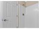 Bright shower with white tile and a white door at 9226 Southern Oak Ln, Ladson, SC 29456