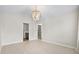 Spacious bedroom featuring vaulted ceilings, hardwood floors and a chandelier at 9428 Sweep Dr, Summerville, SC 29485