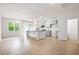 Open concept kitchen featuring stainless steel appliances, a center island, and pendant lighting at 9428 Sweep Dr, Summerville, SC 29485