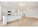 Bright kitchen with granite countertops, stainless steel appliances, and a breakfast bar at 9428 Sweep Dr, Summerville, SC 29485