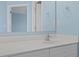 Bright bathroom featuring a white vanity, sink, and mirror against light blue walls at 1047 Tyron Cir, Charleston, SC 29414