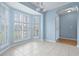 Bright dining area with bay windows, plantation shutters, and tiled floor at 1047 Tyron Cir, Charleston, SC 29414