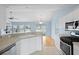 Kitchen features stainless appliances and ample counter space at 1047 Tyron Cir, Charleston, SC 29414