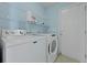 Laundry room featuring modern washer and dryer and ample shelf storage at 1047 Tyron Cir, Charleston, SC 29414