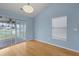 Bright living room with sliding glass doors and hardwood floors at 1047 Tyron Cir, Charleston, SC 29414