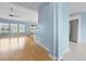 Bright living room features hardwood floors and lots of natural light at 1047 Tyron Cir, Charleston, SC 29414