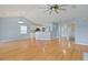Open concept living area with hardwood floors, kitchen, and entryway at 1047 Tyron Cir, Charleston, SC 29414