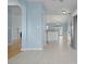 Open concept living space with tile floors and arched doorways at 1047 Tyron Cir, Charleston, SC 29414