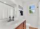 Cozy bathroom featuring stylish fixtures, including a vanity mirror and a bright window at 105 Dalton Ave, North Charleston, SC 29420