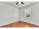 Cozy bedroom with a ceiling fan, bright window, and hardwood flooring at 105 Dalton Ave, North Charleston, SC 29420