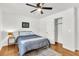 Cozy bedroom features a ceiling fan, neutral walls, and hardwood floors at 105 Dalton Ave, North Charleston, SC 29420