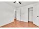 Spacious bedroom featuring hardwood floors, fresh white walls, and a closet with shelving at 105 Dalton Ave, North Charleston, SC 29420