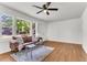 Inviting living room with hardwood floors, ample natural light, and stylish decor creating a warm ambiance at 105 Dalton Ave, North Charleston, SC 29420