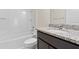 Bathroom featuring granite countertop vanity, toilet, and shower-tub combo at 1086 Lexi Ct, Ladson, SC 29456