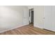 Bedroom featuring wood-look flooring, neutral walls, and a closet for ample storage at 1086 Lexi Ct, Ladson, SC 29456