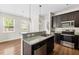 Well-lit kitchen with granite countertops, stainless steel appliances, and hardwood floors at 1086 Lexi Ct, Ladson, SC 29456