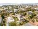 Drone shot of the neighborhood showcasing roof solar panels, pools and beach views at 109 Carolina Blvd, Isle of Palms, SC 29451