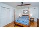 Bedroom features a four poster bed, ceiling fan, and wood floors at 112 Furlong Rd, Summerville, SC 29483