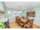Traditional dining room with hardwood floors, a large wooden table, and stylish chairs at 112 Furlong Rd, Summerville, SC 29483