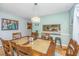 Cozy dining room with elegant chandelier, a view into the kitchen, and space for entertaining at 112 Furlong Rd, Summerville, SC 29483