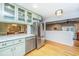 Modern kitchen showcases stainless steel appliances and attractive light-green cabinets at 112 Furlong Rd, Summerville, SC 29483