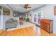 Bright living room with hardwood floors, French doors to the yard, and an adjacent office space at 112 Furlong Rd, Summerville, SC 29483