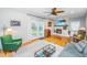 Inviting living room features a brick fireplace, hardwood floors, and natural light from French doors at 112 Furlong Rd, Summerville, SC 29483
