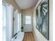 Welcoming entryway with laminate floors, decorated with a large elephant wall art at 11341 Cottageville Hwy, Cottageville, SC 29435