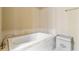 Tiled bathtub with a modern faucet, set in a clean and bright bathroom space at 1215 Dingle Rd, Mount Pleasant, SC 29466