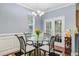 Cozy dining area with hardwood floors, chandelier, and bright lighting at 1215 Dingle Rd, Mount Pleasant, SC 29466