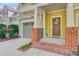 Inviting front porch with well-kept landscaping and appealing curb appeal at 1215 Dingle Rd, Mount Pleasant, SC 29466