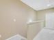 Neutral hallway with beige walls, white trim, and access to various rooms, creating a cohesive and clean transition at 1215 Dingle Rd, Mount Pleasant, SC 29466