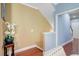 Bright upstairs hallway with hardwood floors and neutral walls at 1215 Dingle Rd, Mount Pleasant, SC 29466