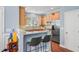 Inviting kitchen features stainless steel appliances, granite countertops, and a breakfast bar with stool seating at 1215 Dingle Rd, Mount Pleasant, SC 29466