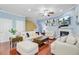 Spacious living room with hardwood floors, comfortable seating, and ample natural light at 1215 Dingle Rd, Mount Pleasant, SC 29466