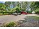 Gravel parking area for cars and boats in a community lot at 1215 Dingle Rd, Mount Pleasant, SC 29466