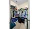 Organized walk-in closet with metal shelving, hanging rods, and storage bins for efficient storage at 1215 Dingle Rd, Mount Pleasant, SC 29466