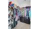 Spacious walk-in closet with ample shelving and hanging space for clothes and accessories at 1215 Dingle Rd, Mount Pleasant, SC 29466