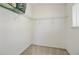 Neutral walk-in closet with wire shelving and a window for natural light at 1215 Dingle Rd, Mount Pleasant, SC 29466