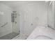 Bathroom with large glass shower, single sink vanity and marble tile flooring creating a spa-like experience at 122 William St, Summerville, SC 29486