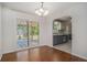 Bright dining room with hardwood floors and access to a covered patio at 122 William St, Summerville, SC 29486