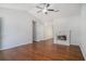 Spacious living room featuring a modern fireplace, ceiling fan, and hardwood floors at 122 William St, Summerville, SC 29486