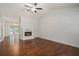 Bright living room with vaulted ceiling, modern fireplace, and hardwood floors at 122 William St, Summerville, SC 29486