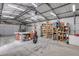 Large, well-lit garage featuring ample storage, work area and space at 1239 Old Orchard Rd, Charleston, SC 29412