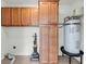Laundry room features storage cabinets, tile floor and utility connections at 1239 Old Orchard Rd, Charleston, SC 29412