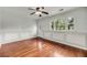 Living room featuring hardwood floors, chair rail molding, neutral paint and abundant light at 1239 Old Orchard Rd, Charleston, SC 29412