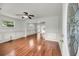 Spacious living room with hardwood floors, crown molding, and ample natural light at 1239 Old Orchard Rd, Charleston, SC 29412
