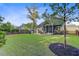 Well-maintained backyard featuring green grass, a patio with seating, and privacy fencing at 132 Daniels Ridge Dr, Summerville, SC 29485